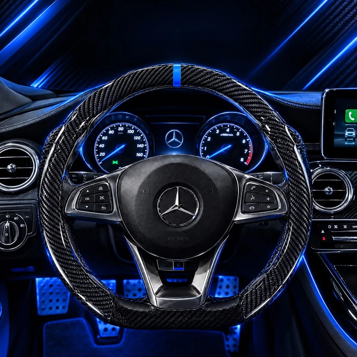Carbon Blue cover installed on a steering wheel with blue ambient lighting