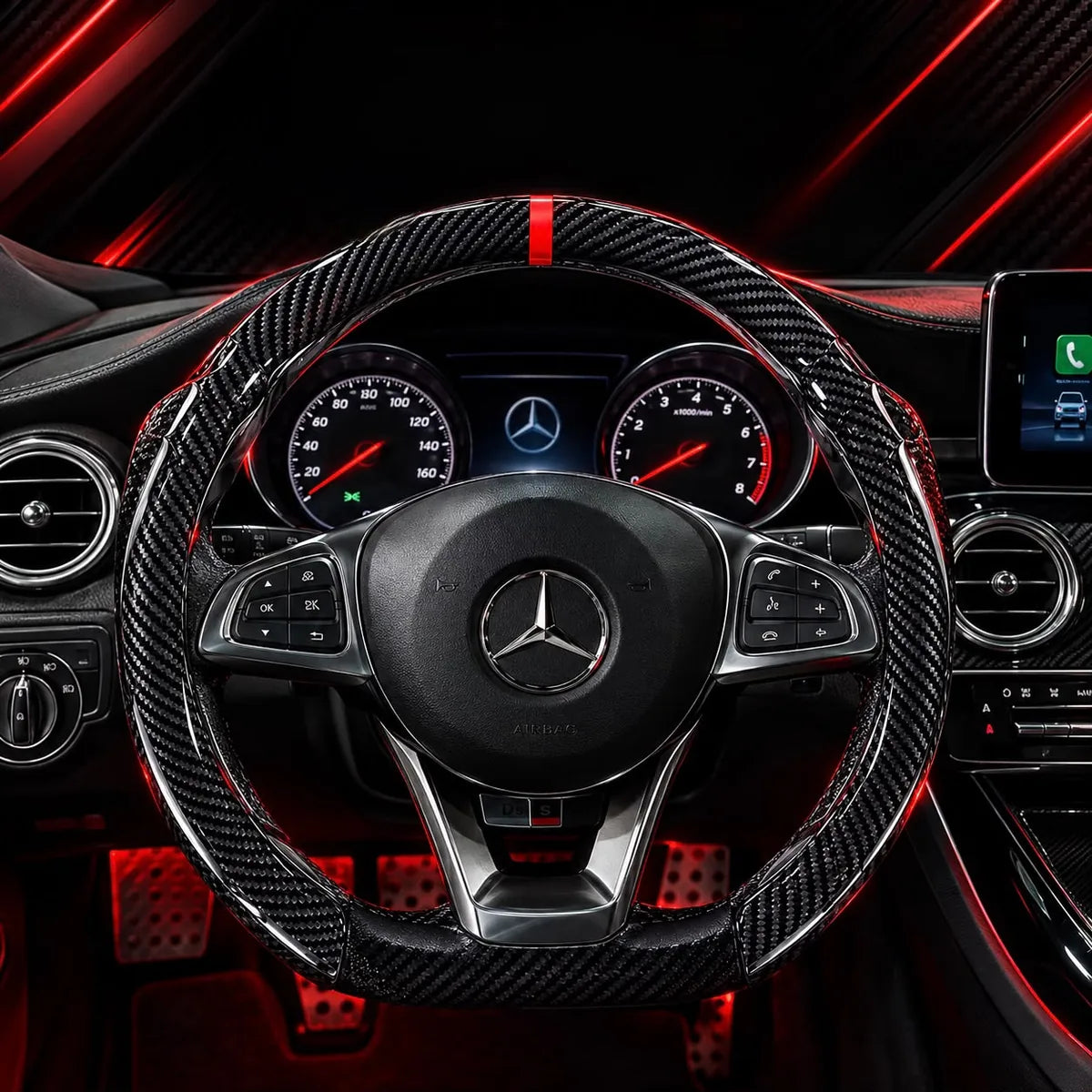 Carbon Red cover installed on a steering wheel with red ambient lighting