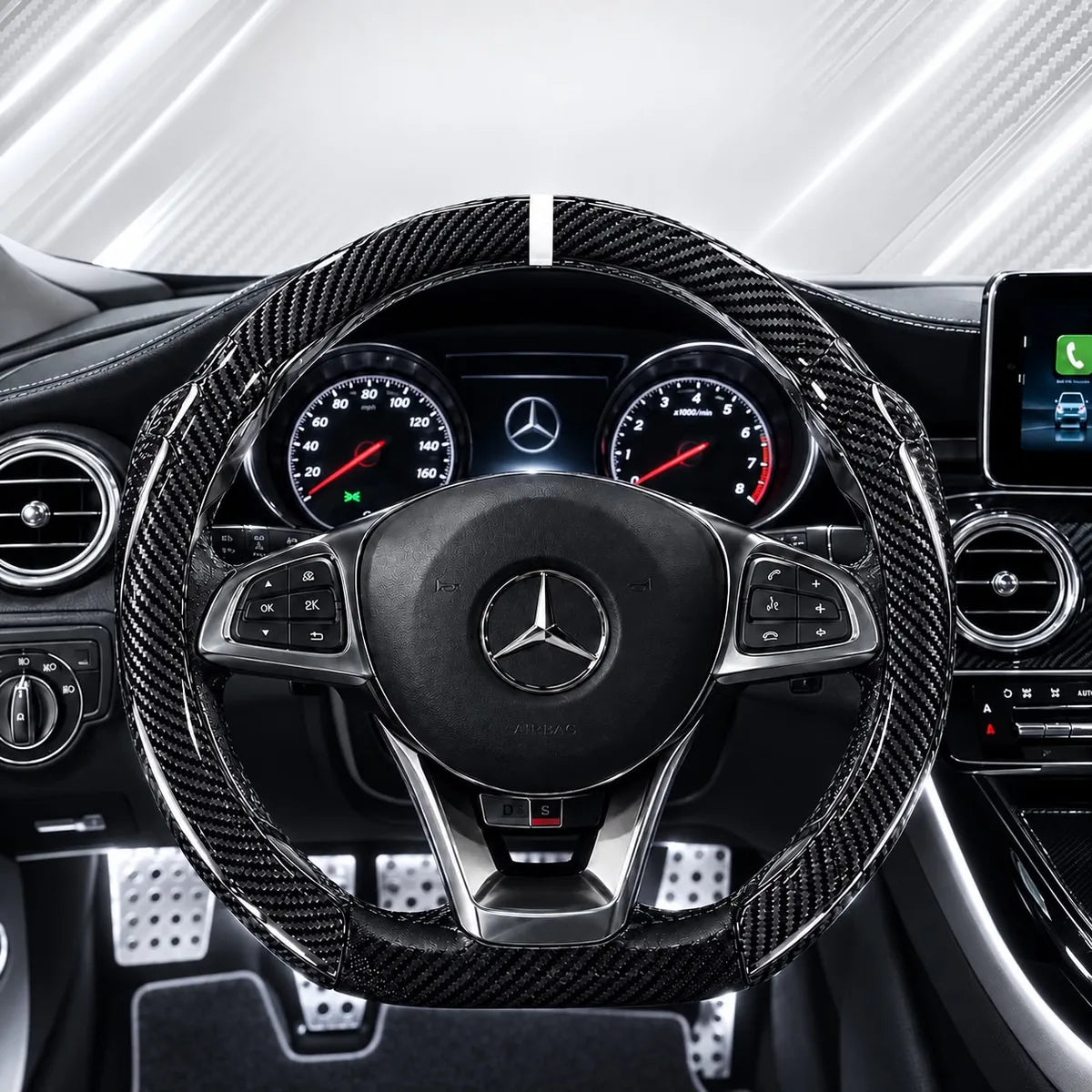 Carbon White cover installed on a steering wheel with bright white lighting
